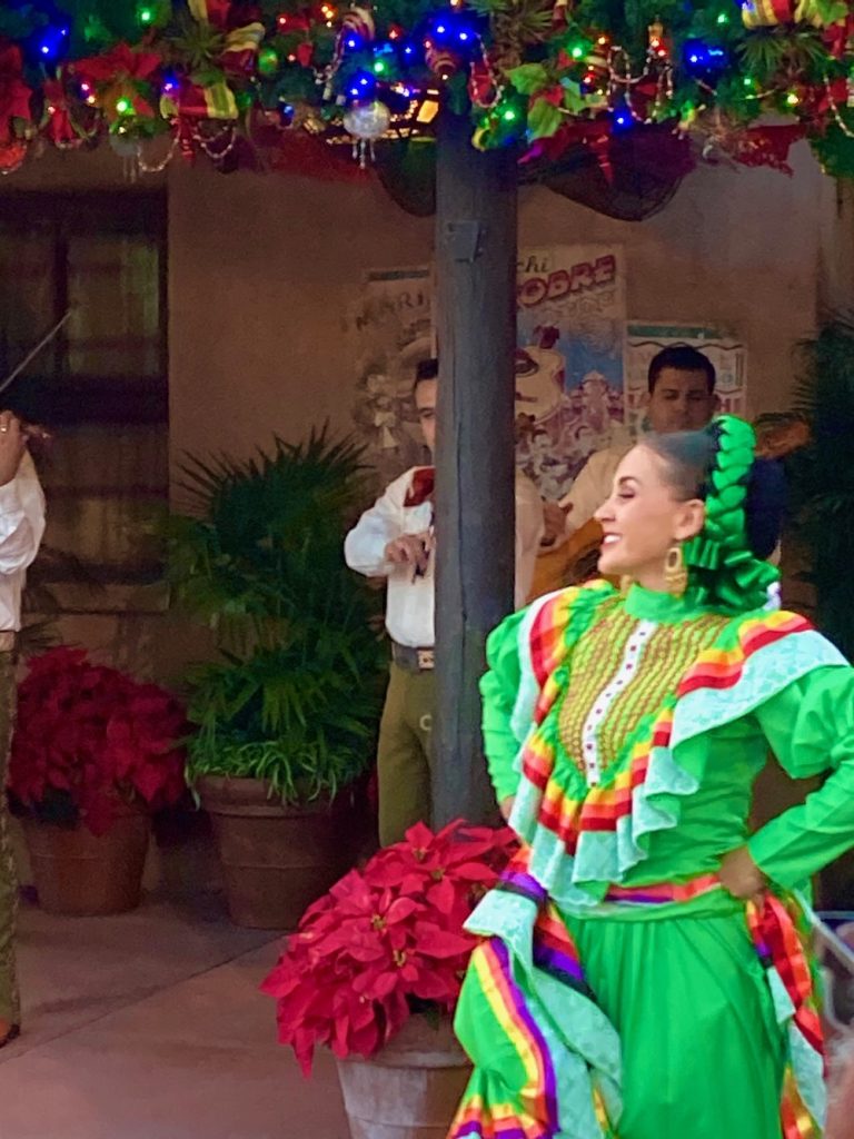 Mariachi Cobre, accompanied by traditional Mexican dancers.