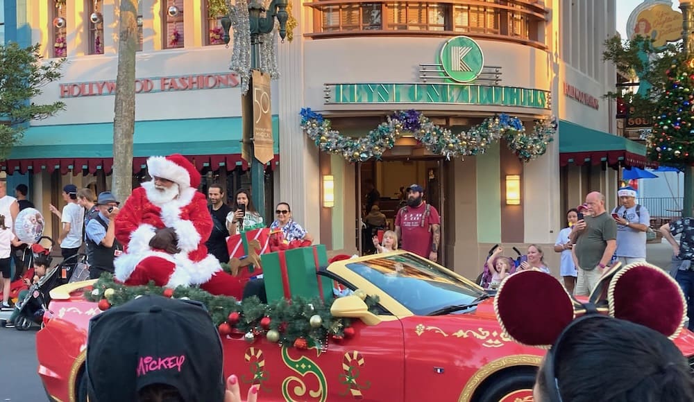 Santa in a vintage automobile at The Hollywood Studios.